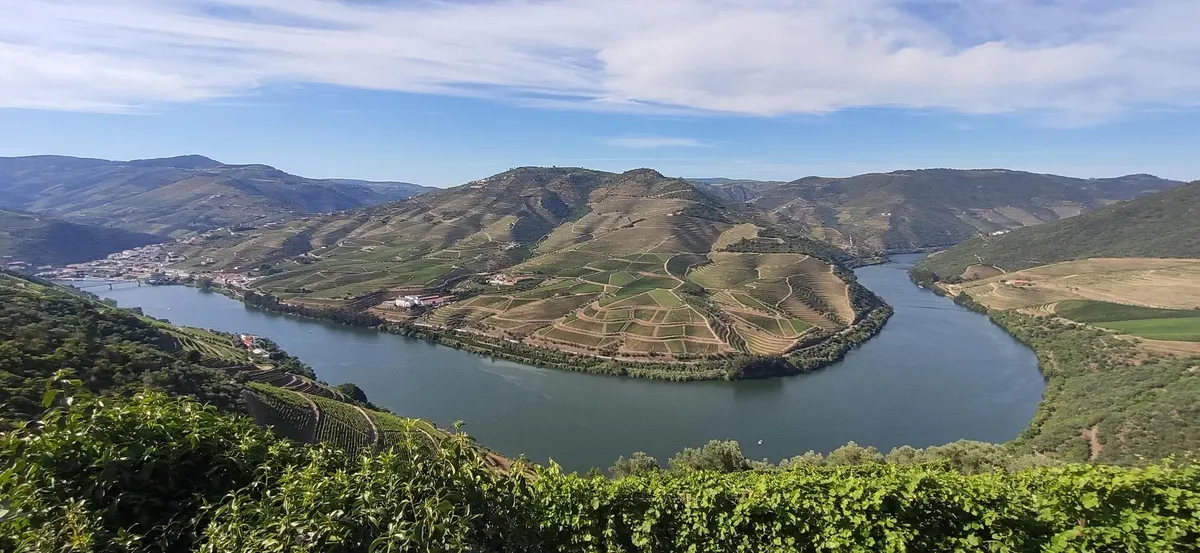 Rabelo boat moored at Pinhão quay on the half-day Douro Valley tour with Croft winery tasting and boat cruise